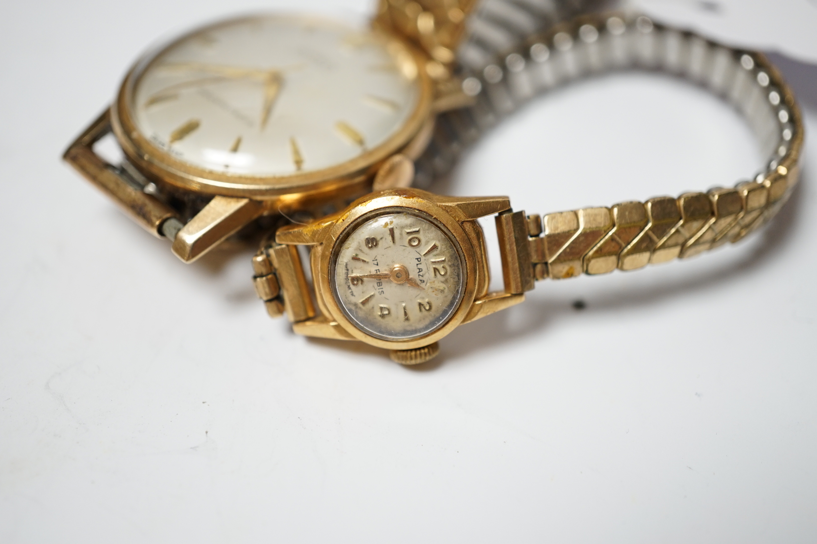 A lady's 18ct gold Plaza manual wind wrist watch, on a steel and gold plated flexible strap, together with a gentleman's 9ct gold Derrick automatic wrist watch, on a flexible strap.